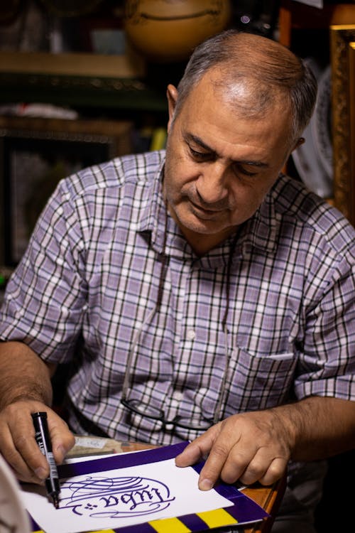 Man Writing with a Marker 