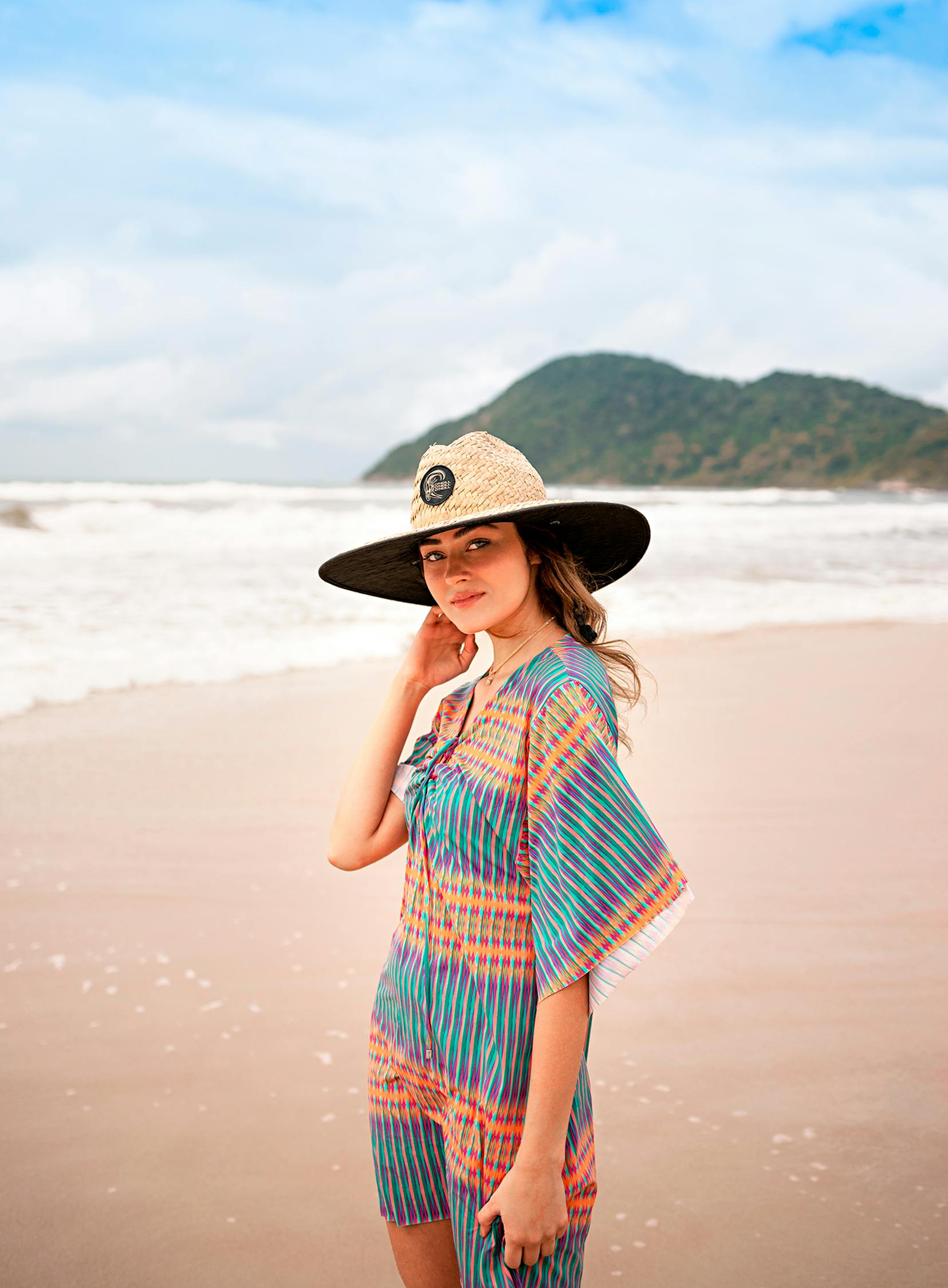 Photo of Woman Standing On Seashore