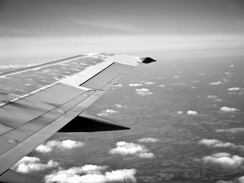 Aerial Photography of Plane Wing and Sky