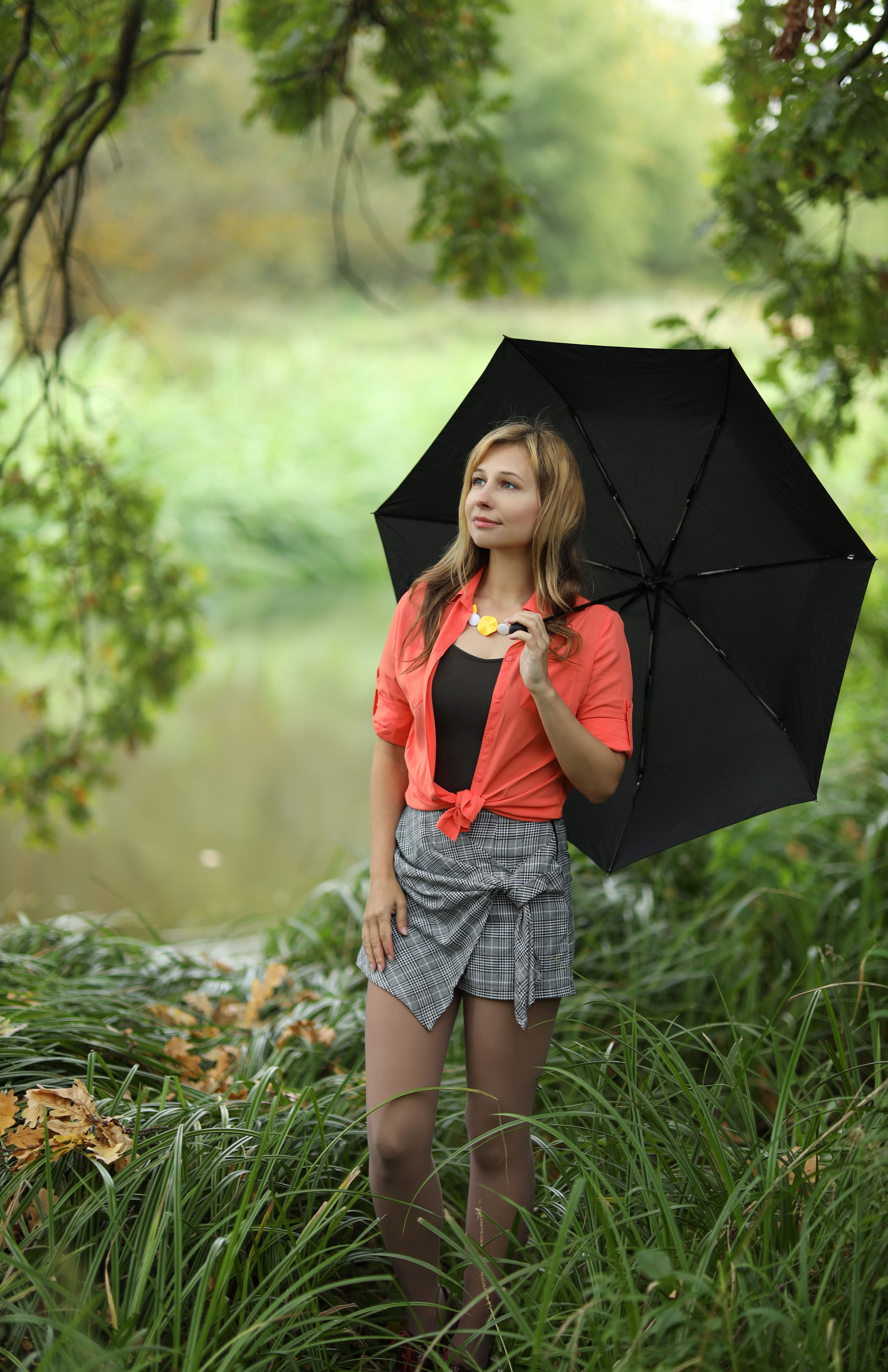 Woman Posing with Umbrella in a Forest · Free Stock Photo
