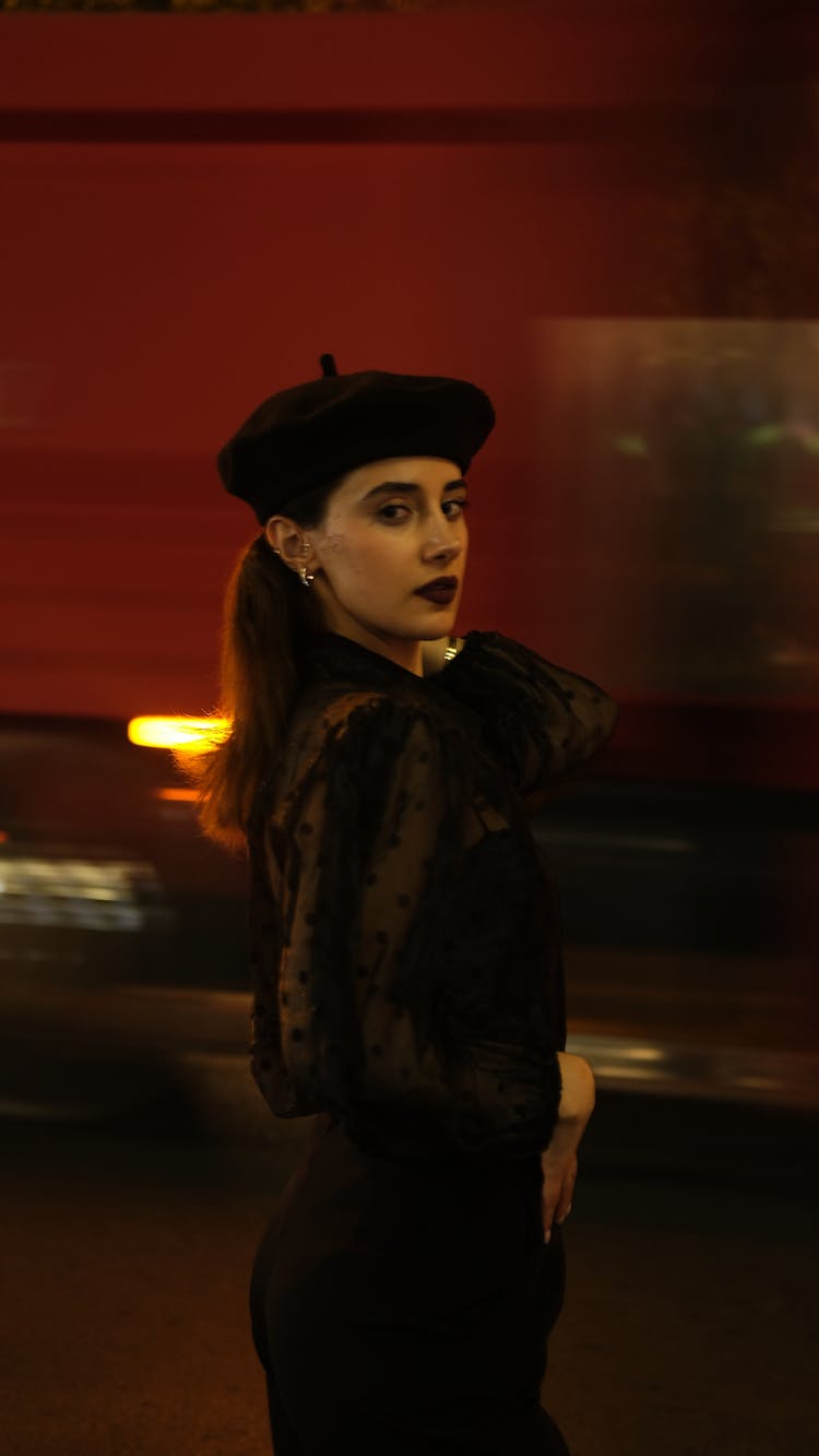 Young Elegant Woman Posing In A Black Outfit 