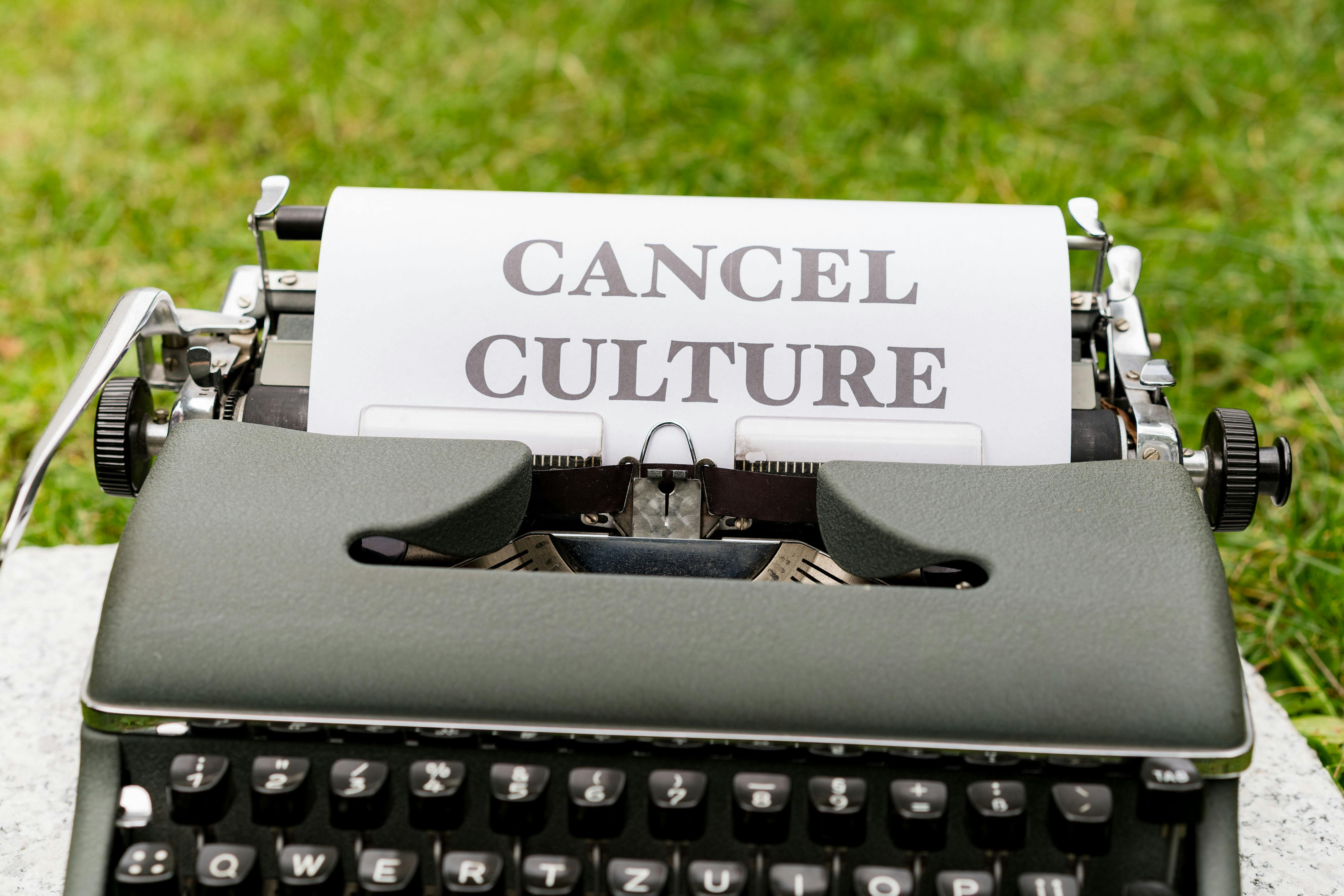 a typewriter with the words cancel culture on it