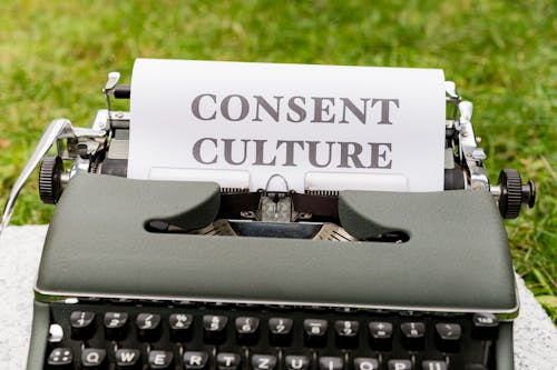 A typewriter with a paper that says consent culture