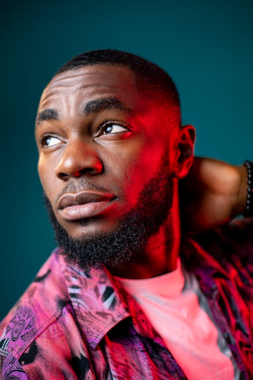 Modern Studio Shot of a Bearded Man Looking Away 