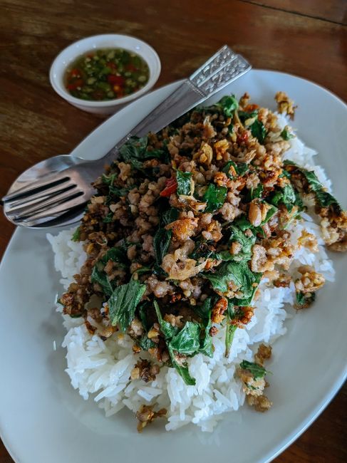 Quickly stir-fried ground chicken with garlic, chile, and Thai holy basil.