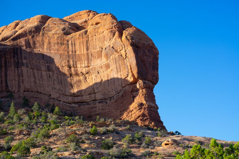 Breathtaking view of a red rock formation in the desert landscape of Moab, Utah.