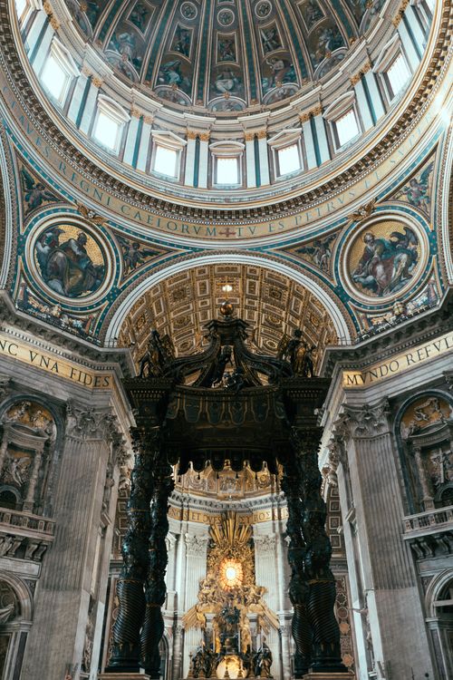 Free Stunning view of the ornate dome and altar inside St. Peter's Basilica, Vatican City. Stock Photo
