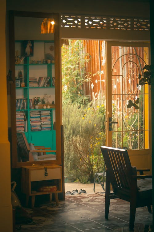 Room Interior with a Bookcase and an Open Door 