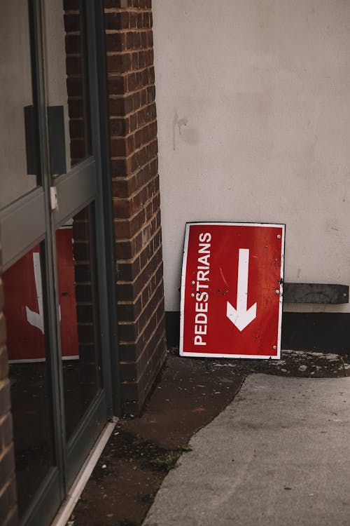 Abandoned Pedestrians Sign in Front of an Entrance to a Building