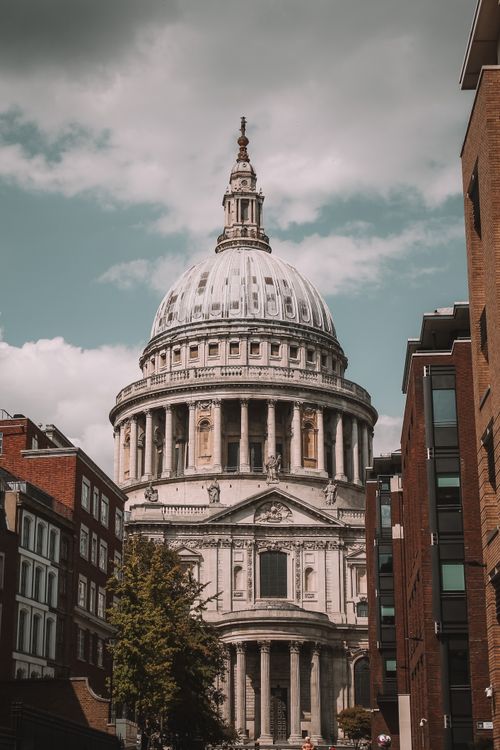 Free View of St. Paul's Cathedral in London showcasing its iconic dome and architectural details. Stock Photo