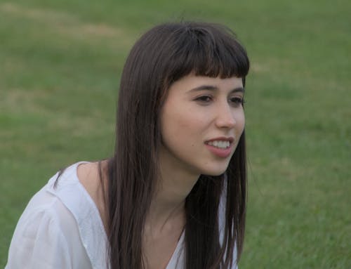 Photo of a Young Woman in a Park