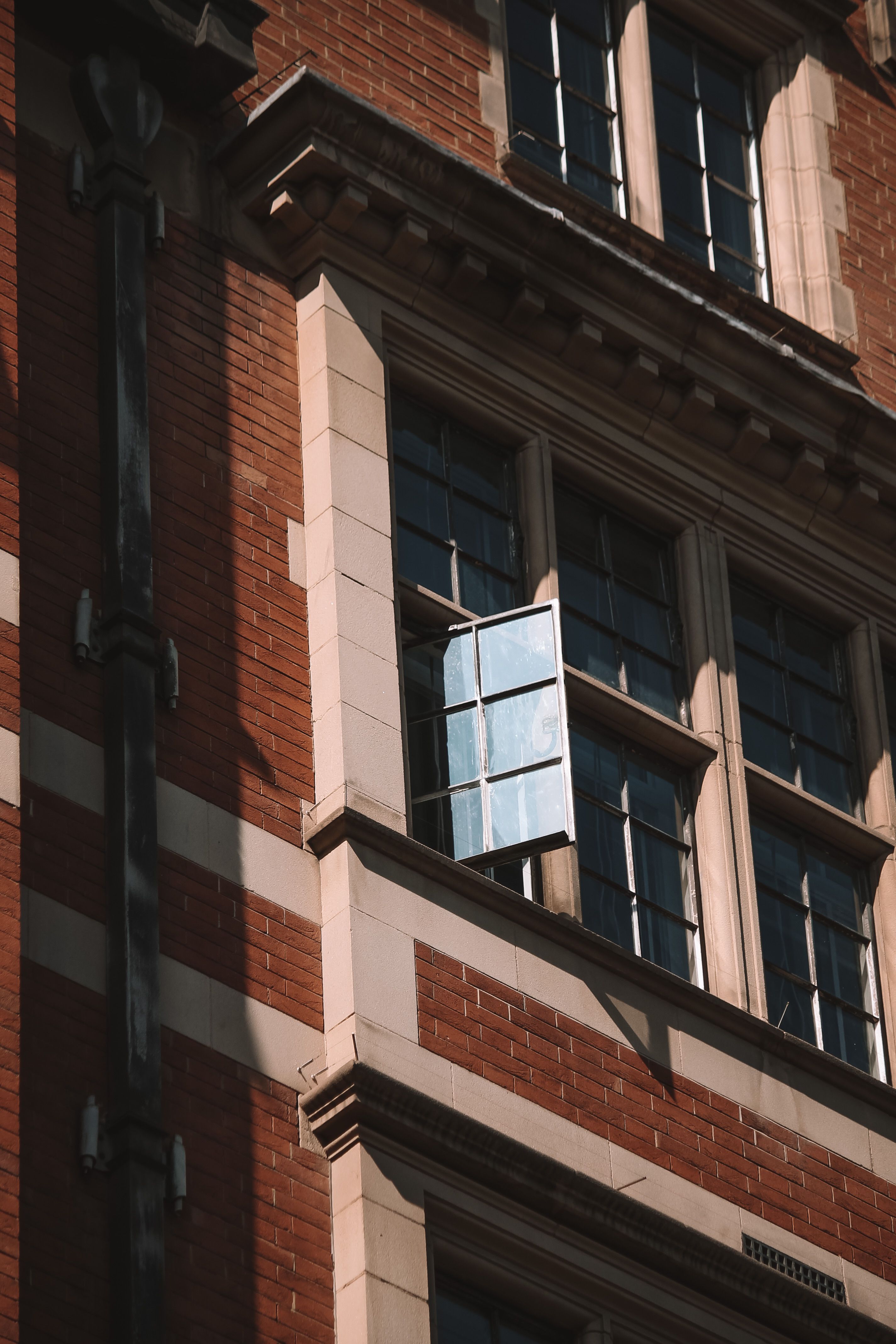 Windows in a Red Brick Building · Free Stock Photo