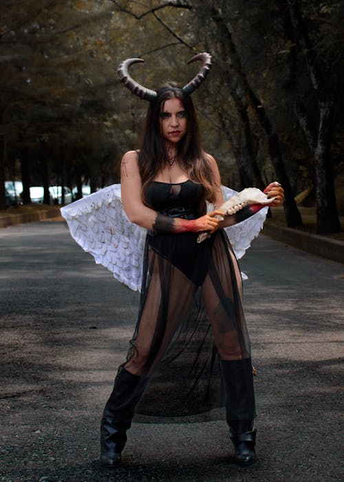 A Woman in an Angel Devil Costume
