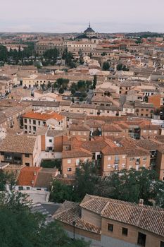 A stunning aerial view of Toledo, Spain showcasing its historic architecture and vibrant urban landscape.