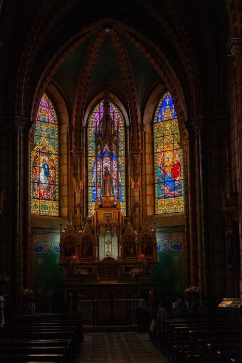 Free Interior view of beautiful stained glass windows in a Quito church. Stock Photo