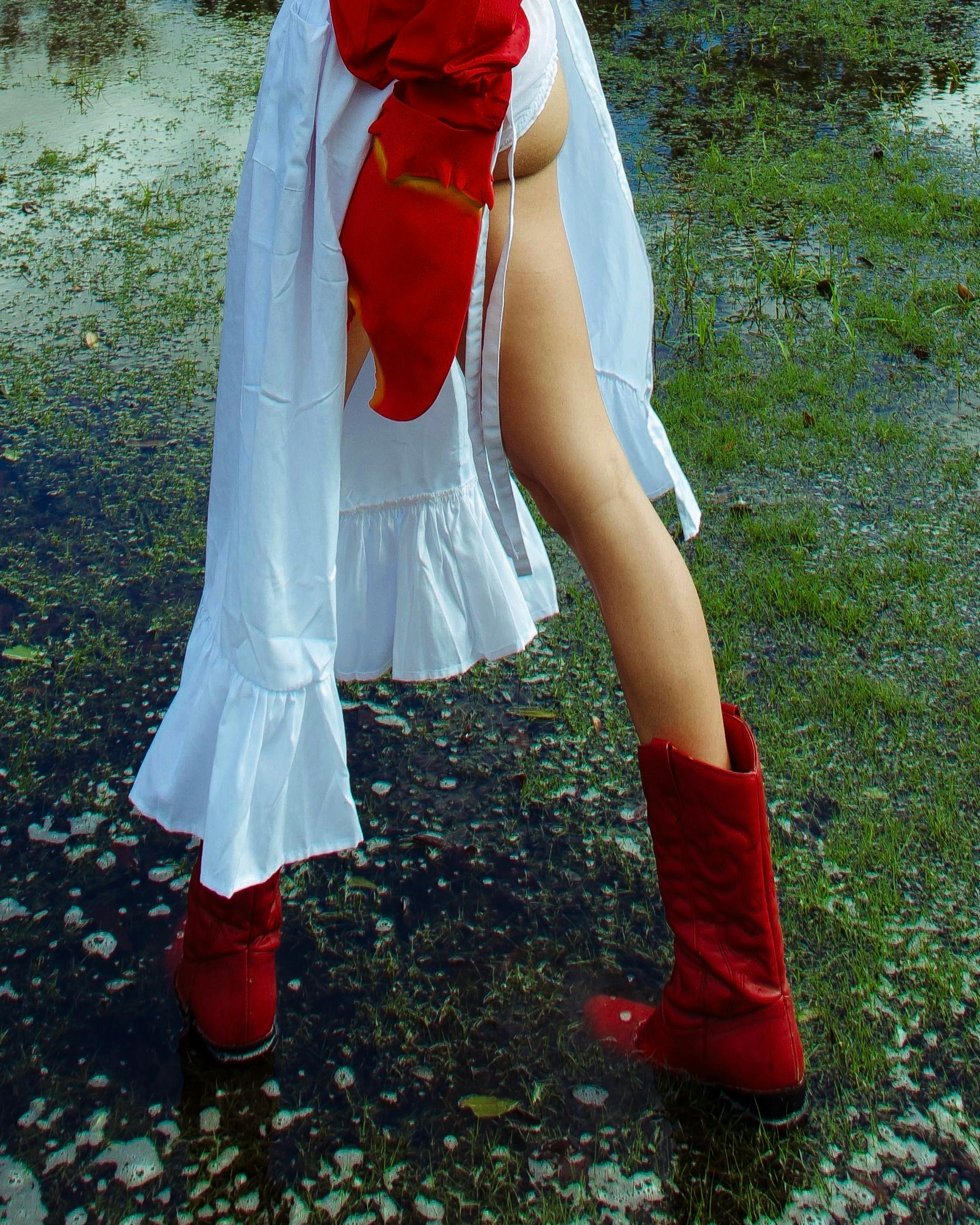 A person wearing white boots free stock photo