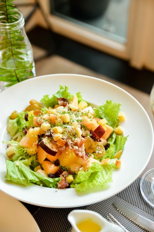 Free Colorful salad featuring fresh fruits and vegetables served in a Hồ Chí Minh City restaurant. Stock Photo