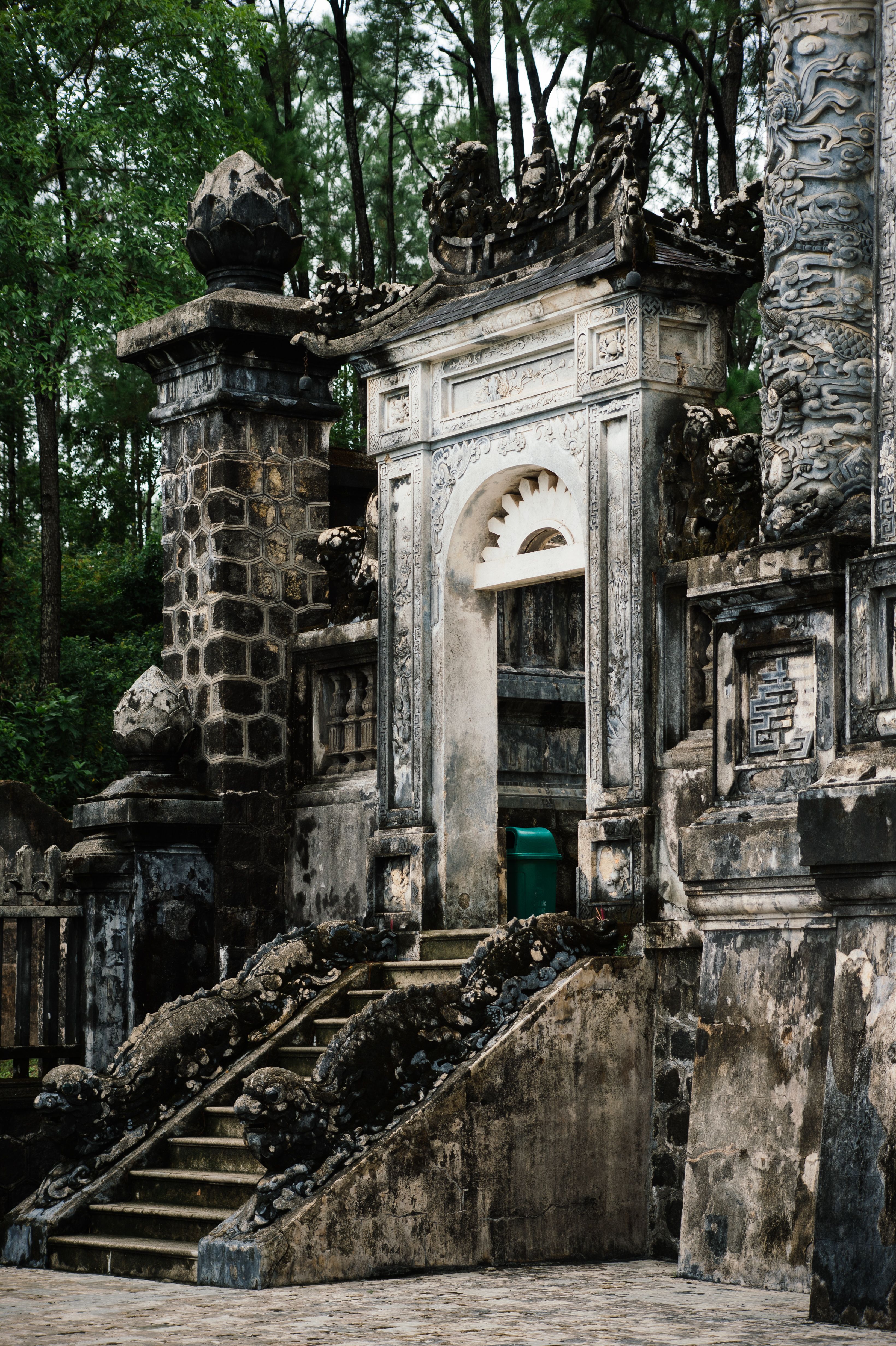 Detailed view of Khai Dinh Tomb's intricate stone architecture in Hue, Vietnam.