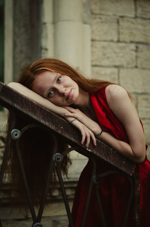 Redhead Model in Red Dress