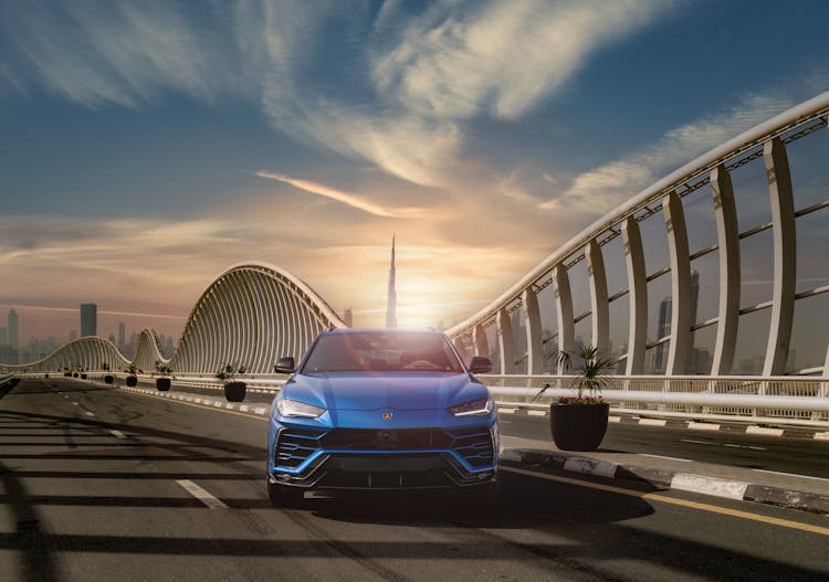 Blue Lamborghini Urus On Meydan Bridge In Dubai