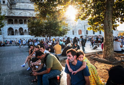 People Sitting on Square near Hagia Sophia at Sunset