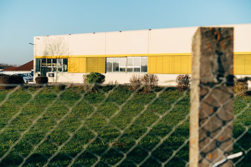 Commercial building perimeter with security fencing