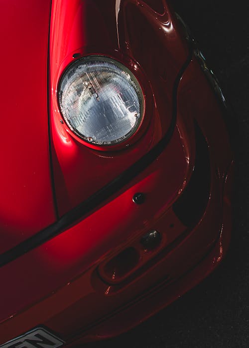 Headlight of a Red Sports Car