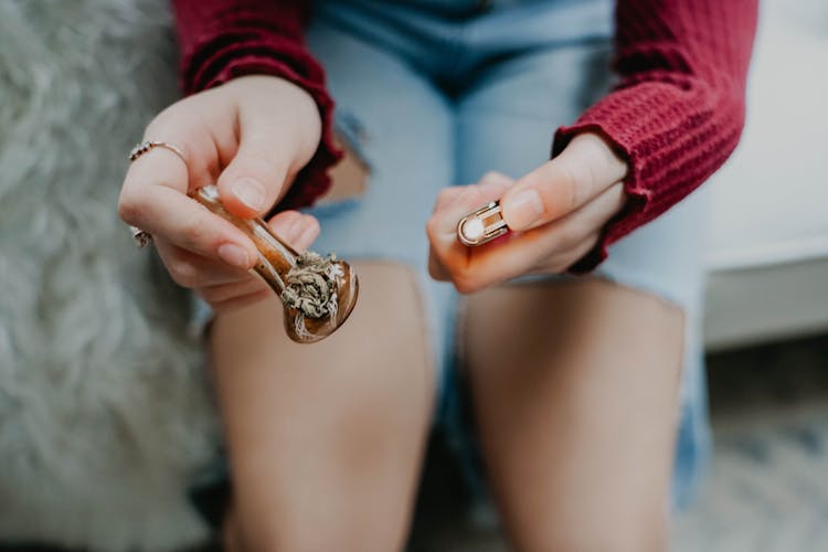 Woman Hands Holding Lighter