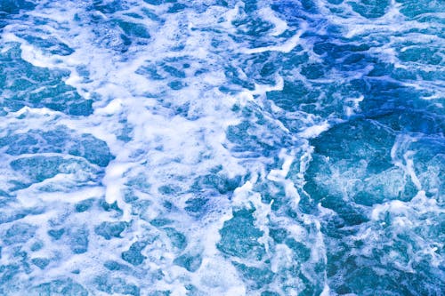 Blue Photograph of Rough Water