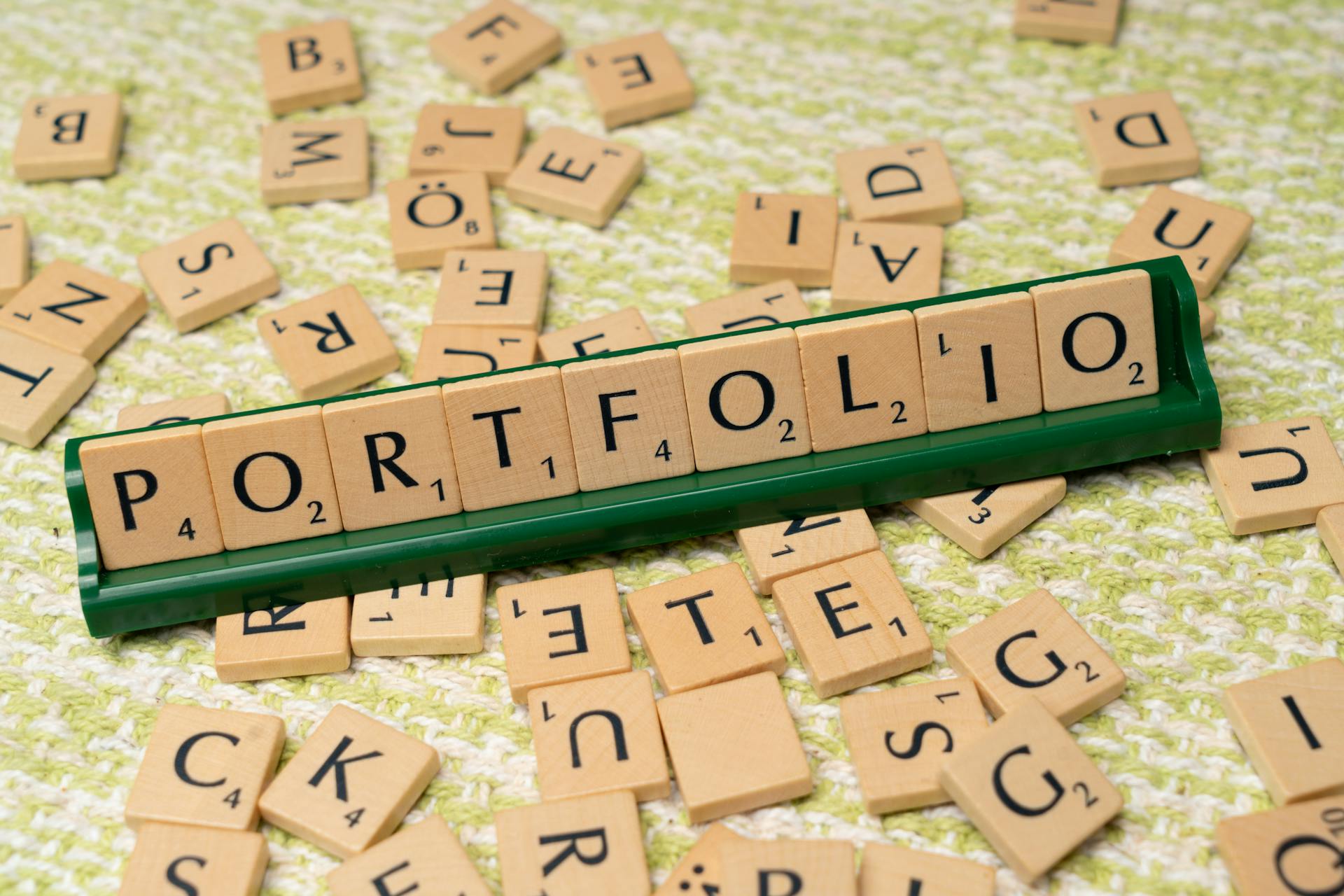 A wooden block with the word portfolio on it