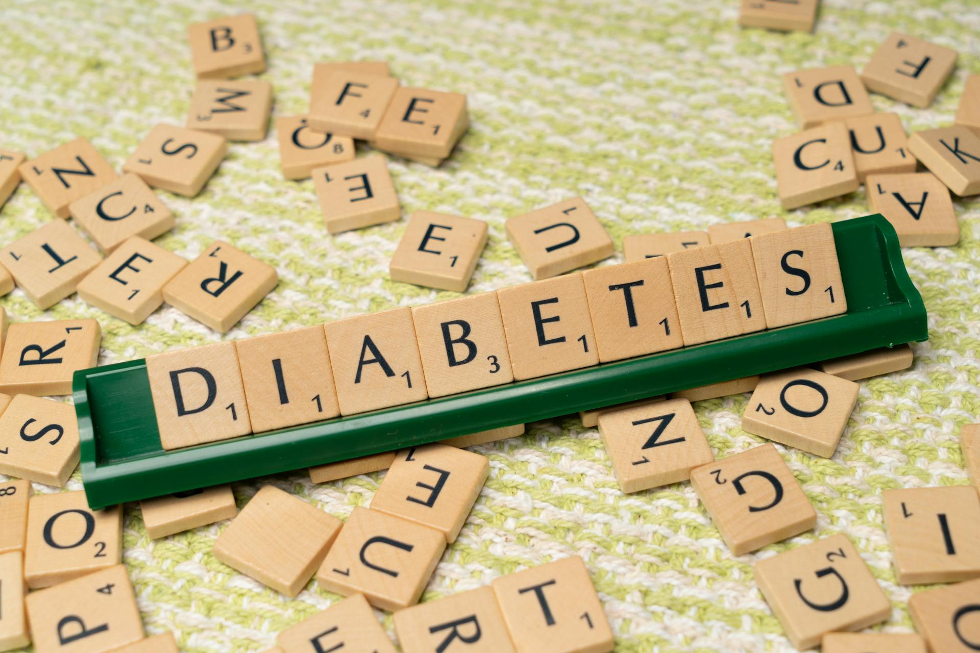 Diabetes and the word diabetes on a green background