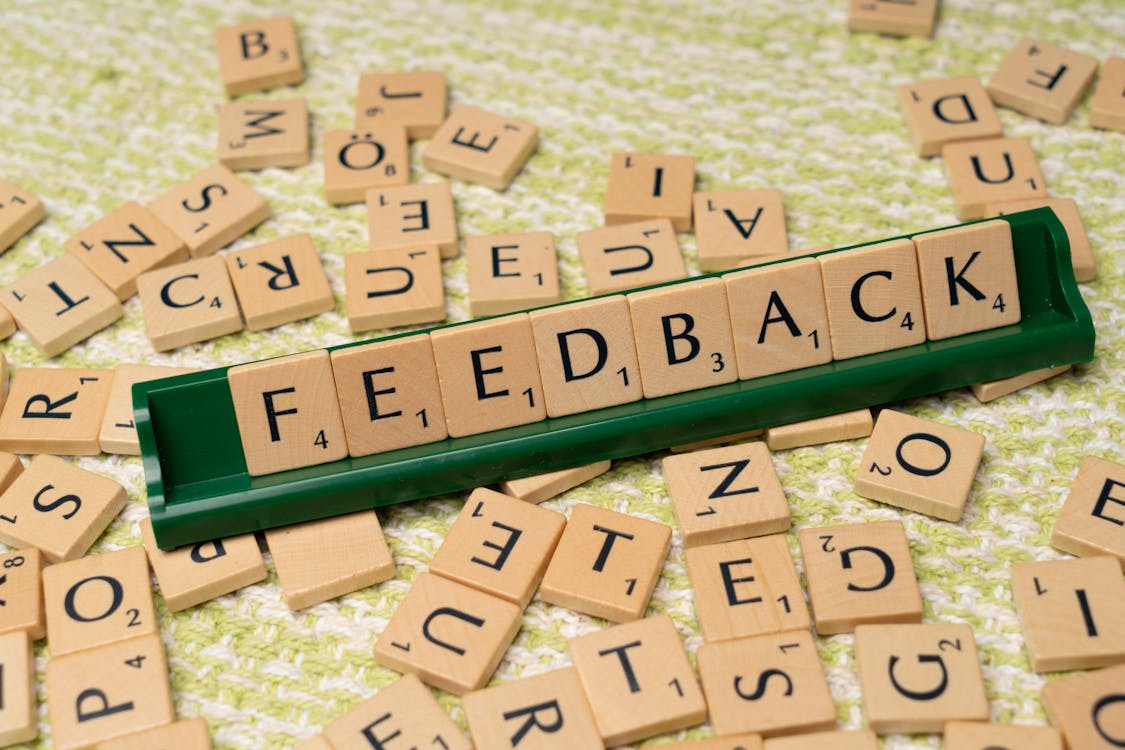 Free The word feedback is spelled out with scrabble tiles Stock Photo