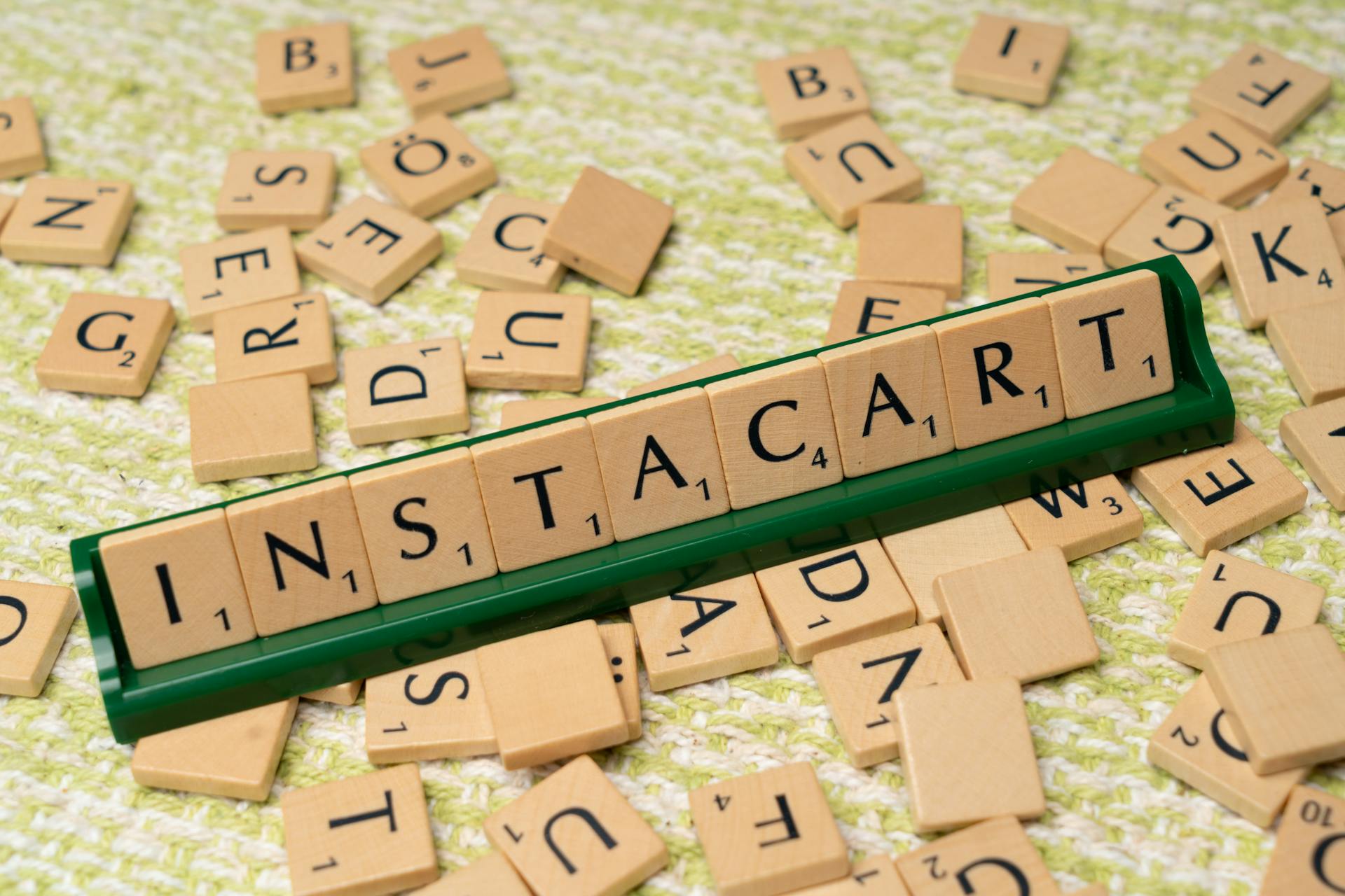 A wooden block with the word instacart written on it