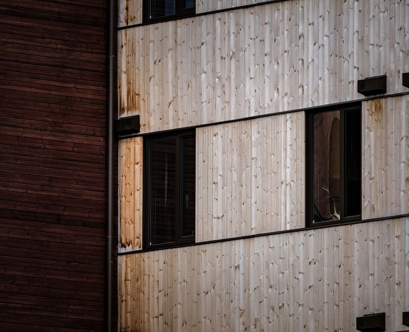 Different types of siding materials displayed on a house