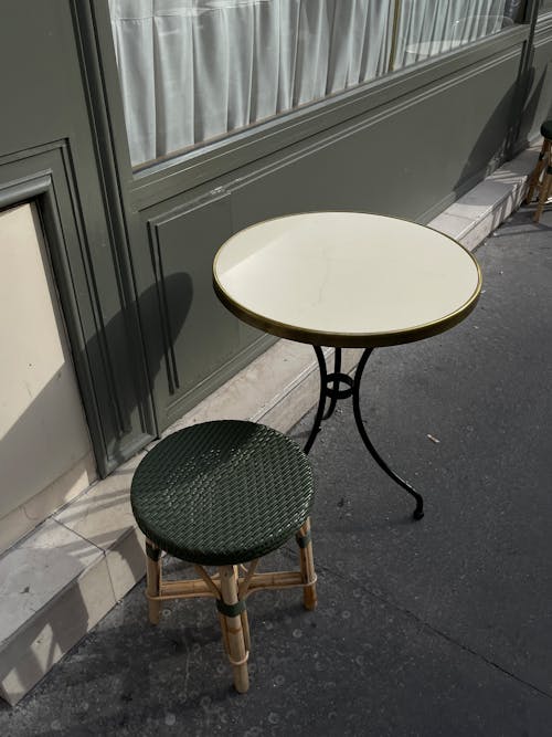 Table and Chair on Pavement