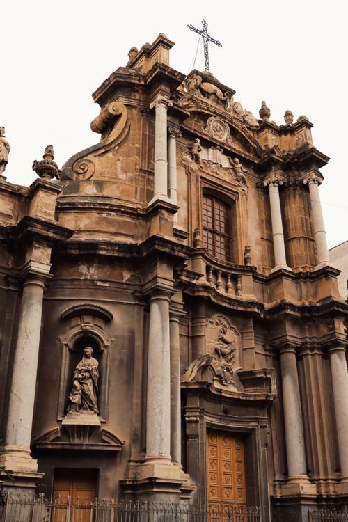 Free Stunning baroque facade of historic church in Palermo, Sicily, Italy, showcasing intricate design and religious sculptures. Stock Photo