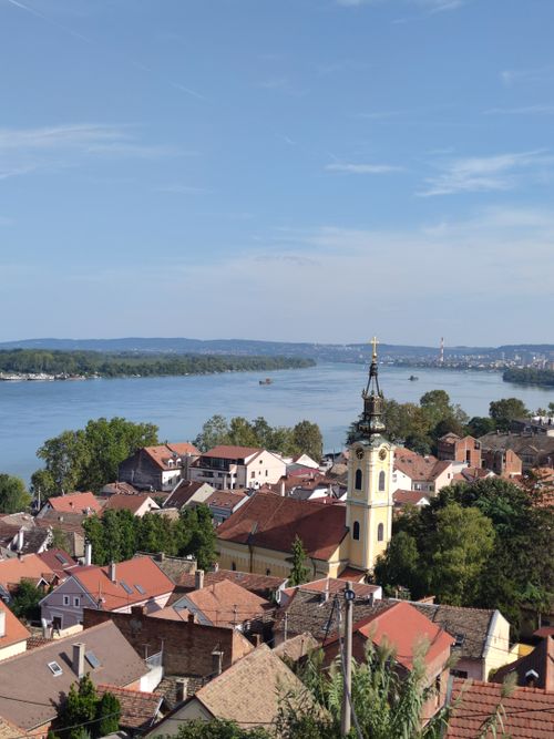 Free A picturesque view of Zemun with the Danube River and historical church tower. Stock Photo