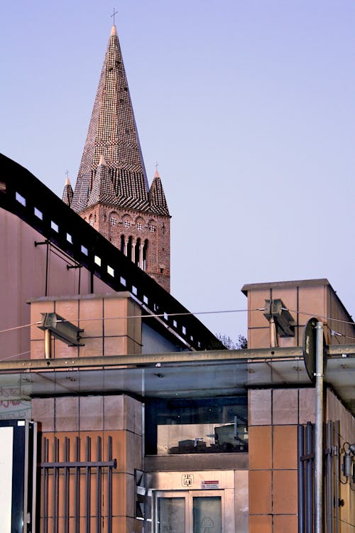 Church Tower over Building in Genoa in Italy