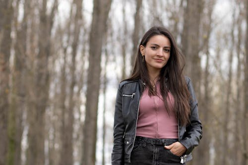 Smiling Woman in Brown Jacket