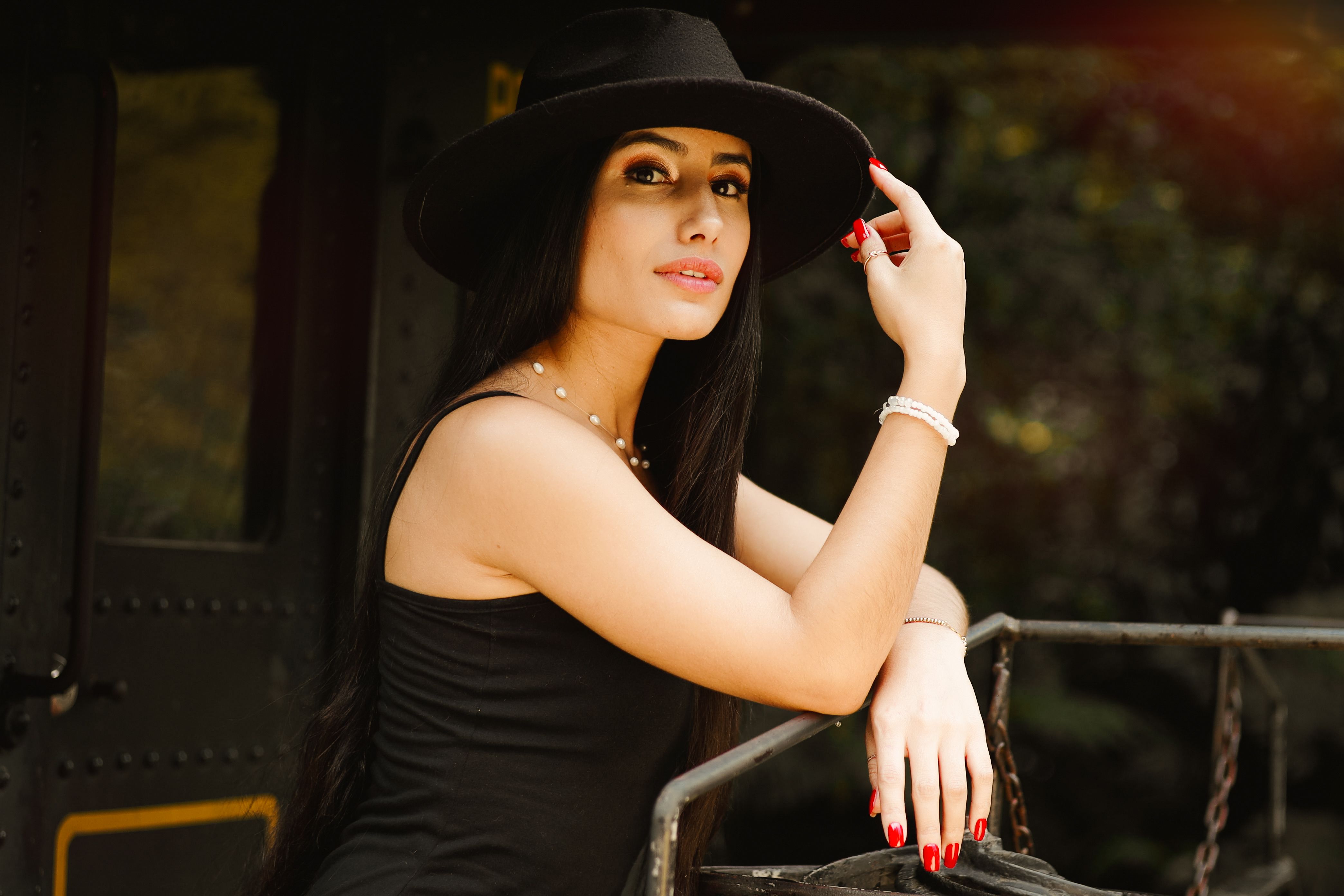 Portrait of Woman Wearing Black Hat · Free Stock Photo