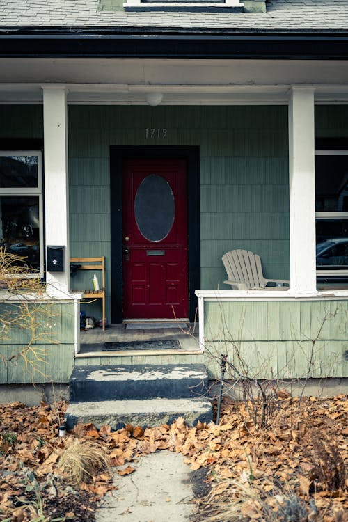 Front of the House with Autumnal Leaves on the Yard