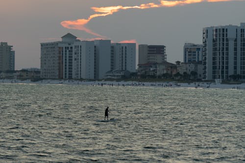 Paddle Boarder at Sunset