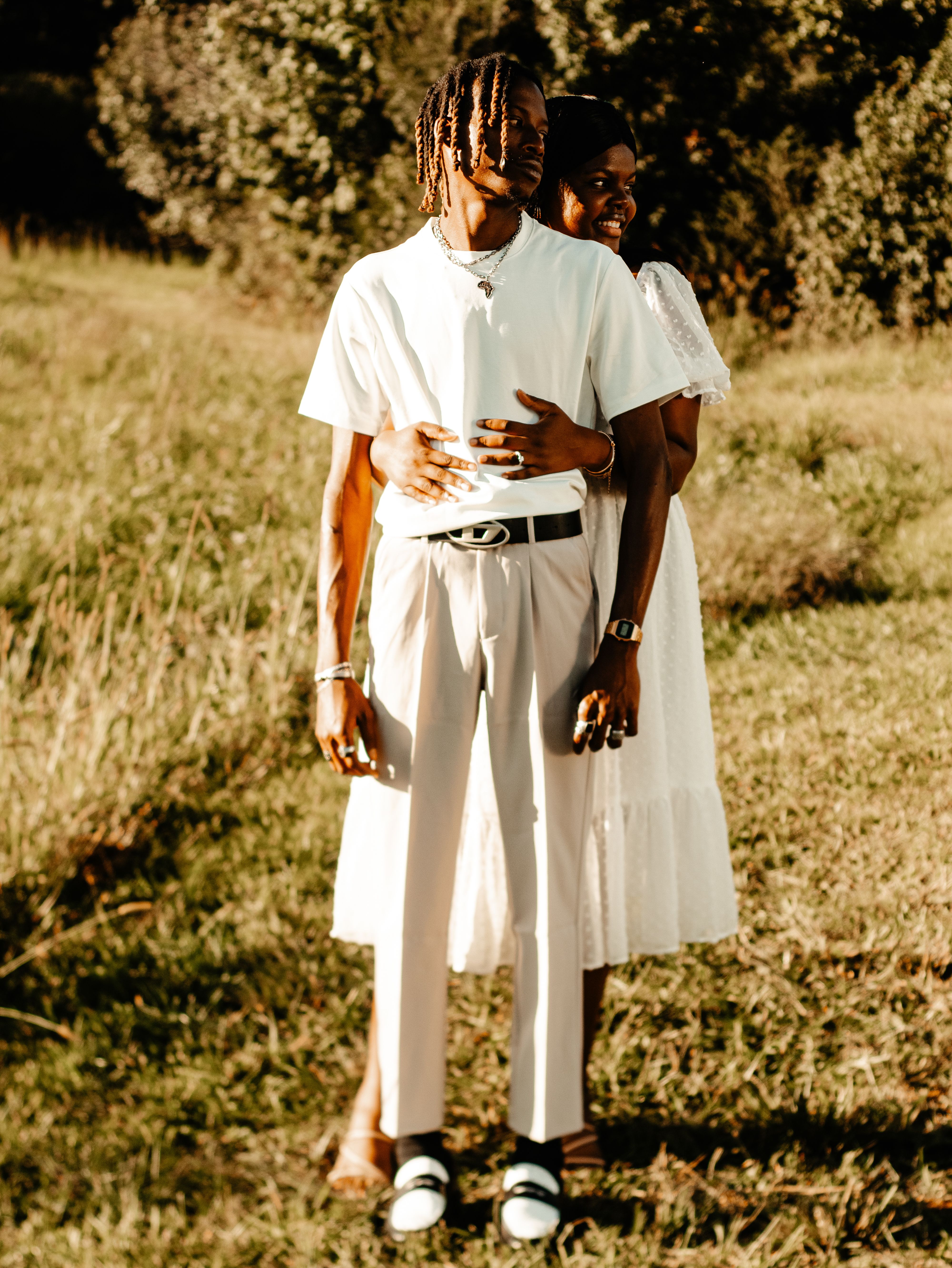 Woman in a White Dress Hugging to Her Boyfriend Back · Free Stock Photo