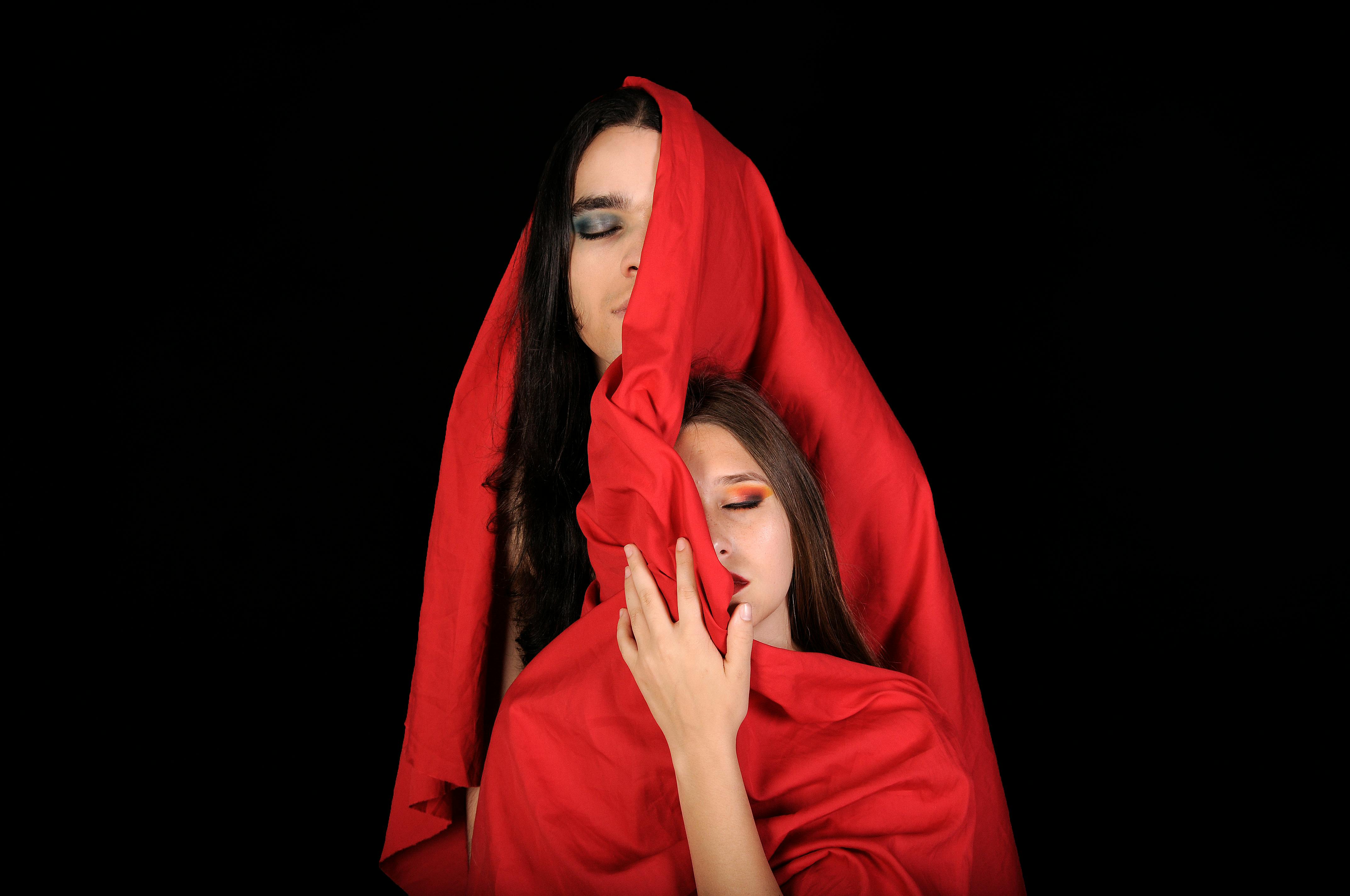 women with red scarf