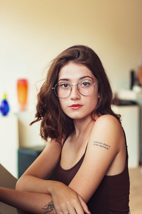 Woman in Black Top and Eyeglasses