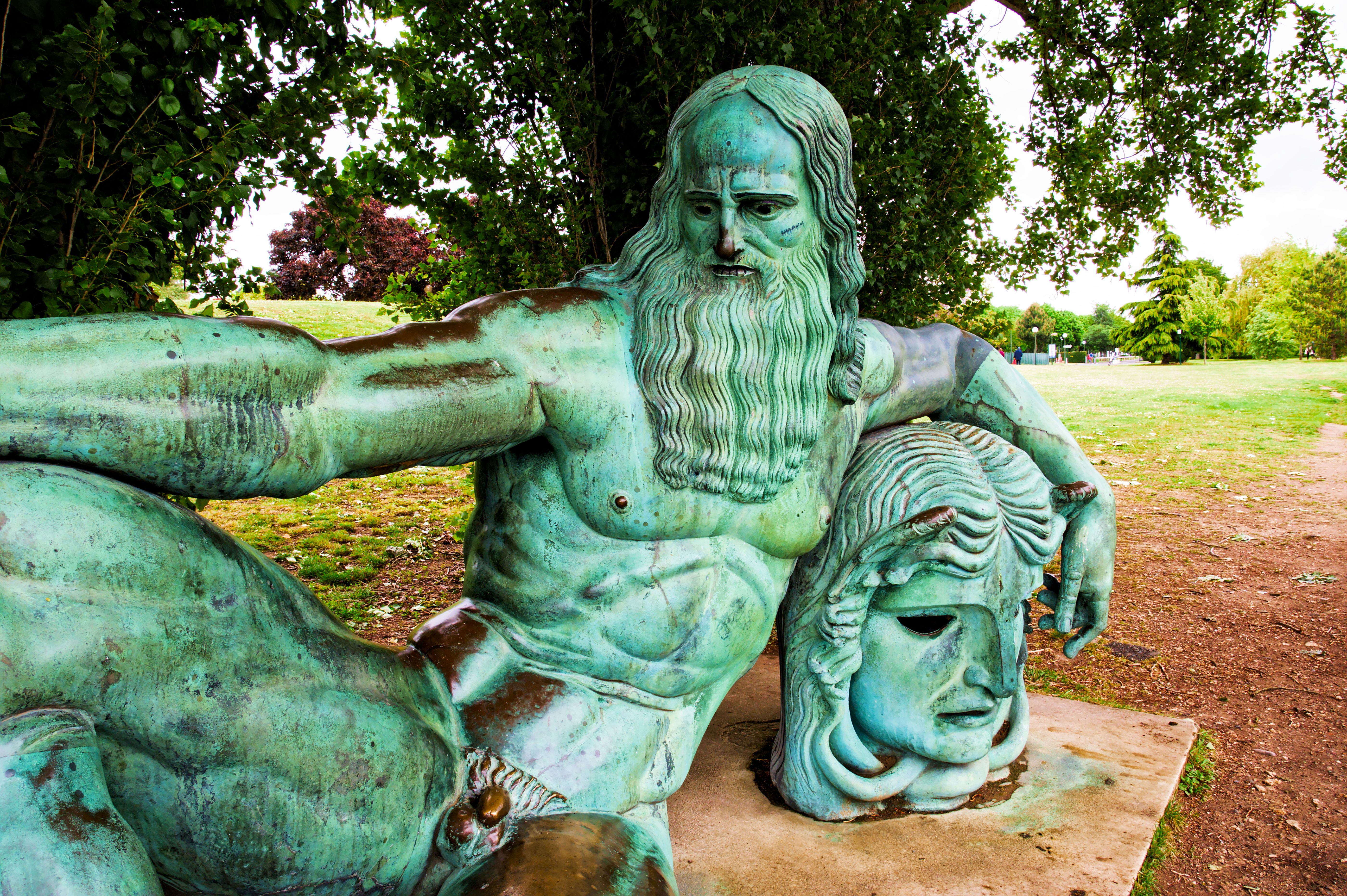 Bronze sculpture of Leonardo da Vinci in a park in Amboise, France.