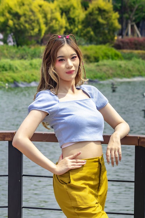 Model in Cropped Top and Yellow Pants