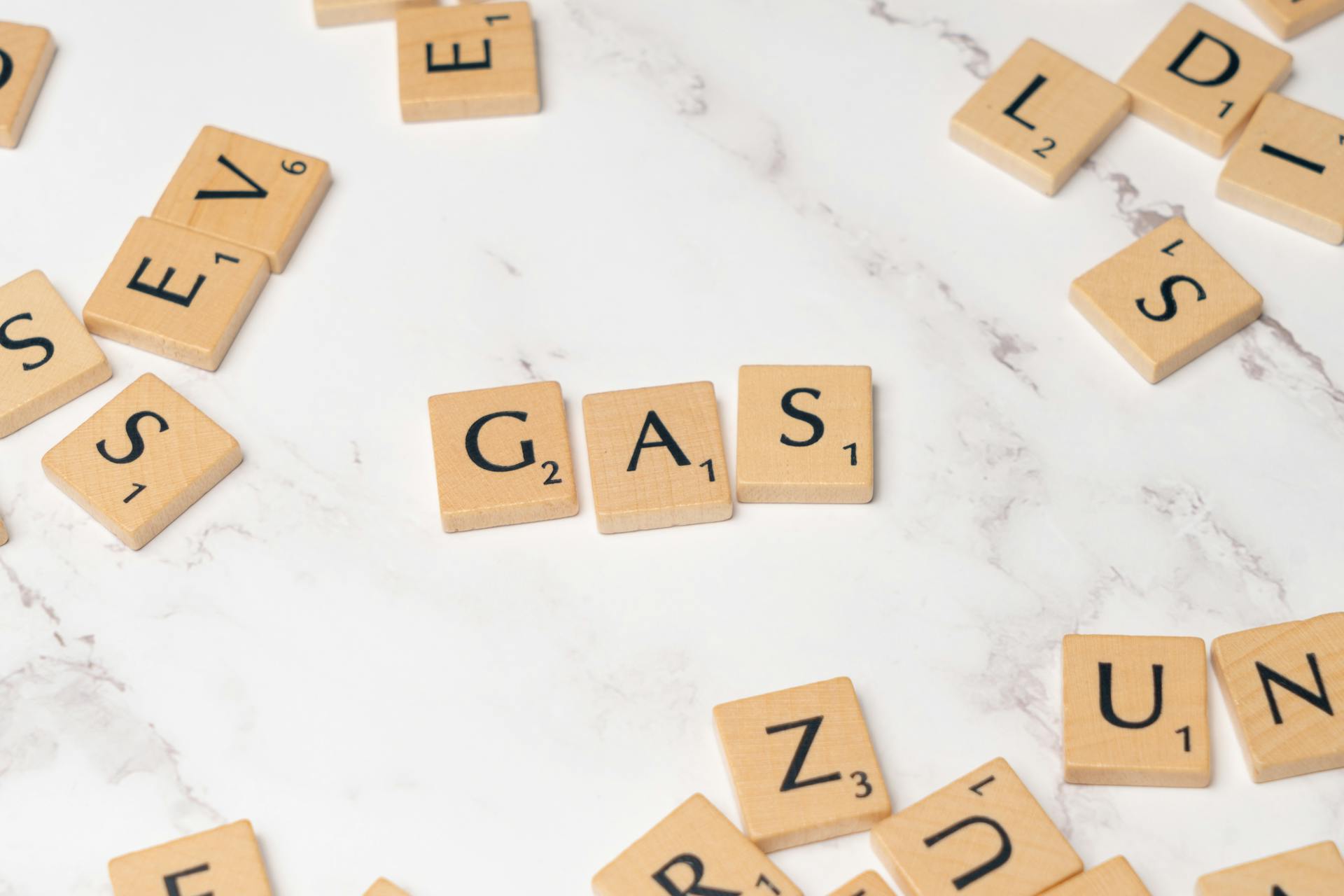 Gas is spelled out in scrabble letters