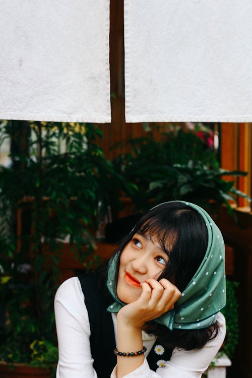 Free Smiling Woman Looking Up Stock Photo