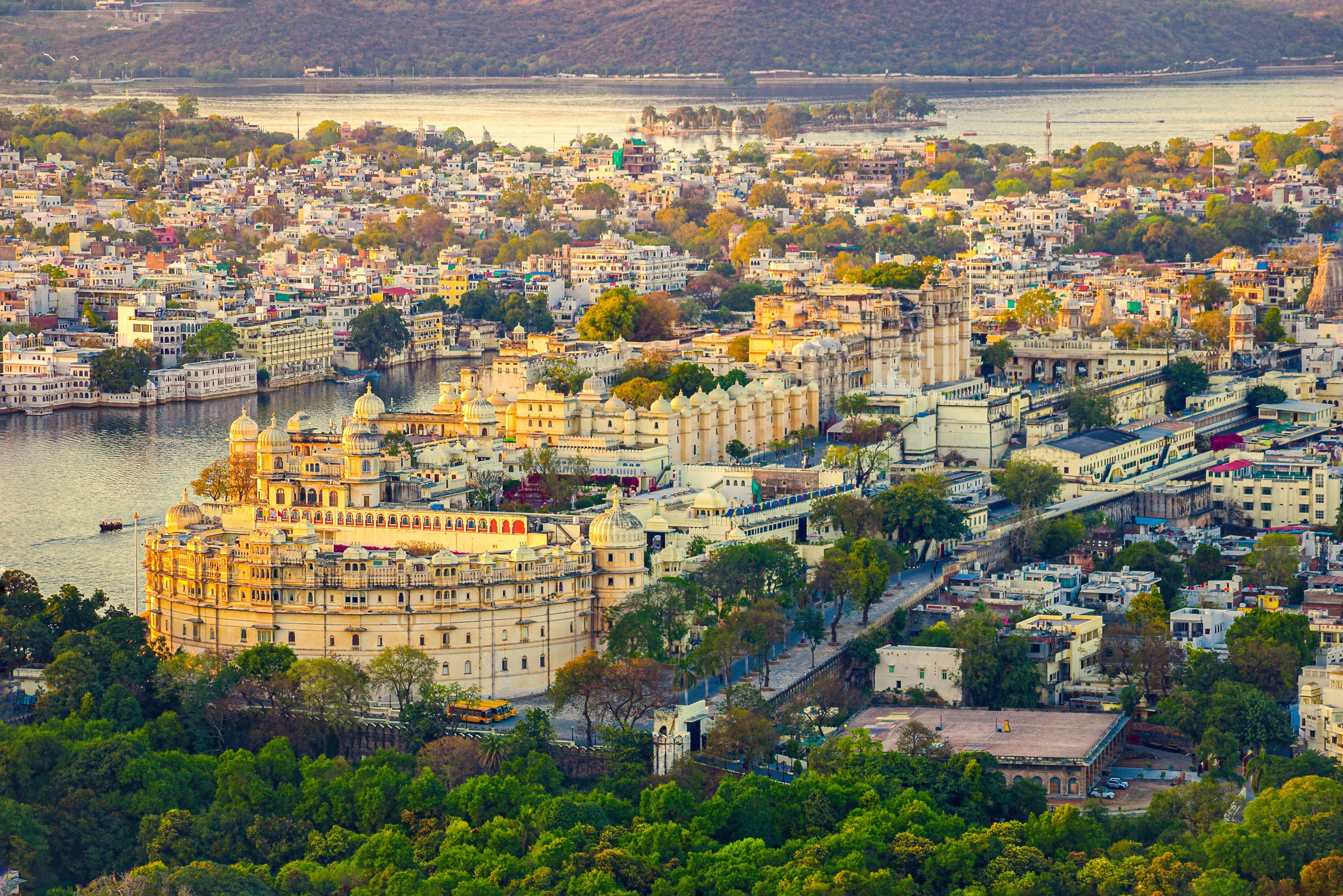Aerial view of Udaipur's City Palace and old town beside the lake